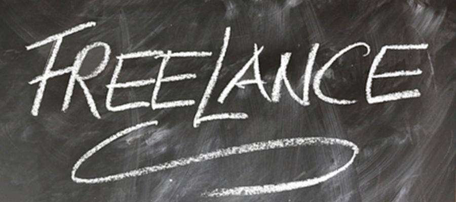 The word Freelance written on a black board